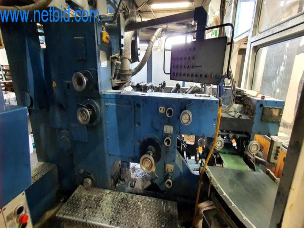 Stroje v tiskárně
-17