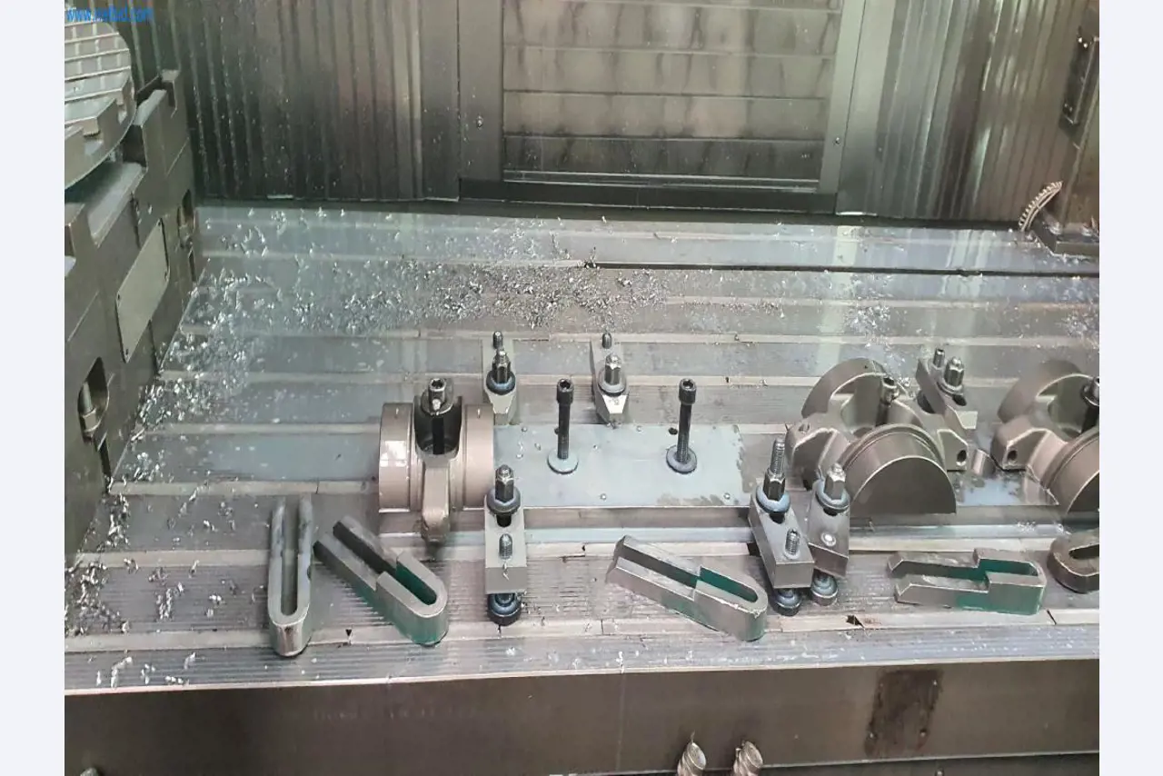 Machines for the production of milled, turned and grinding parts-9