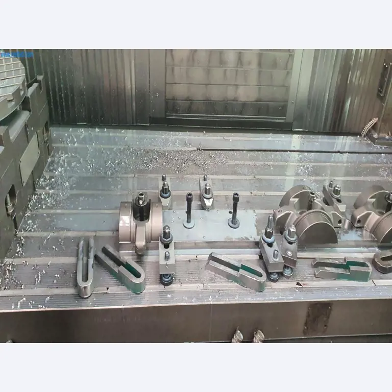 Machines for the production of milled, turned and grinding parts-9