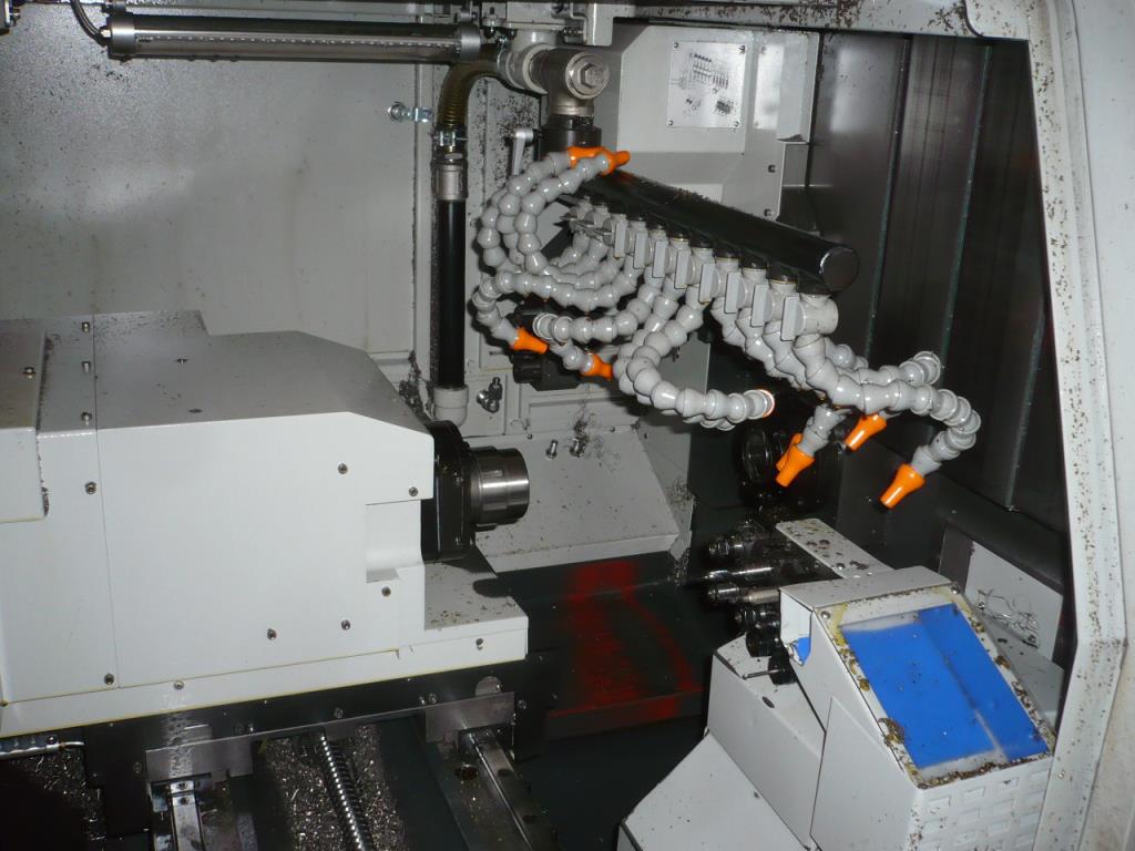 Tokarka CNC z przesuwaną głowicą-8