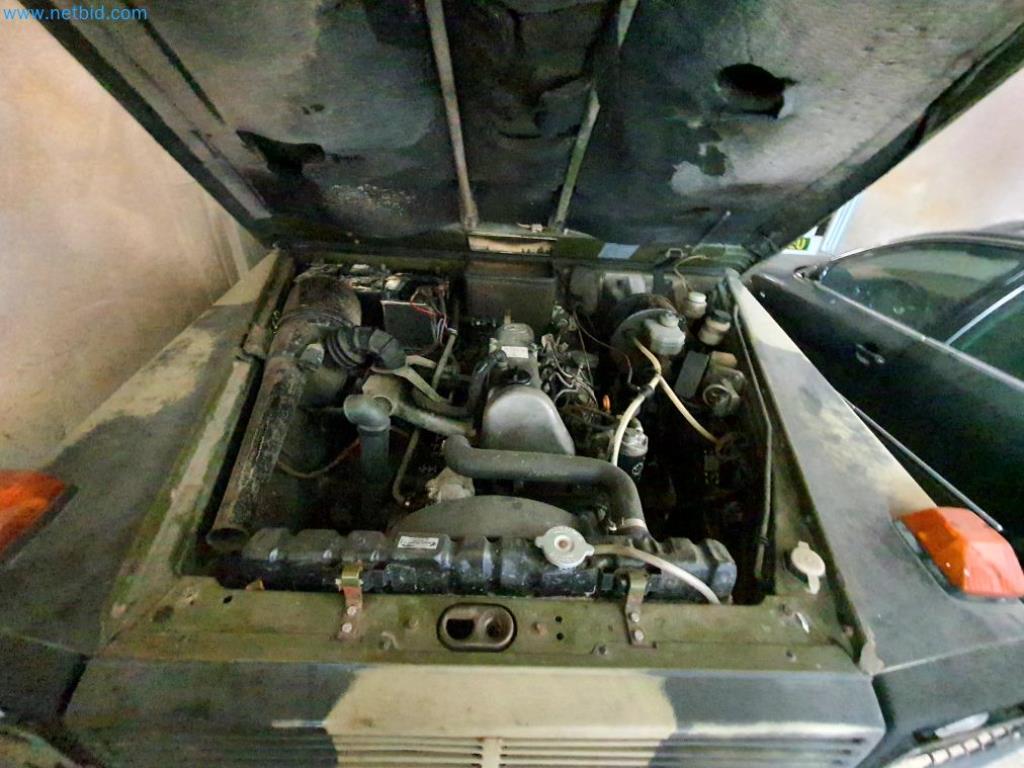 Likwidacja magazynu firmy usługowej, pojazdy, wyposażenie magazynu-18