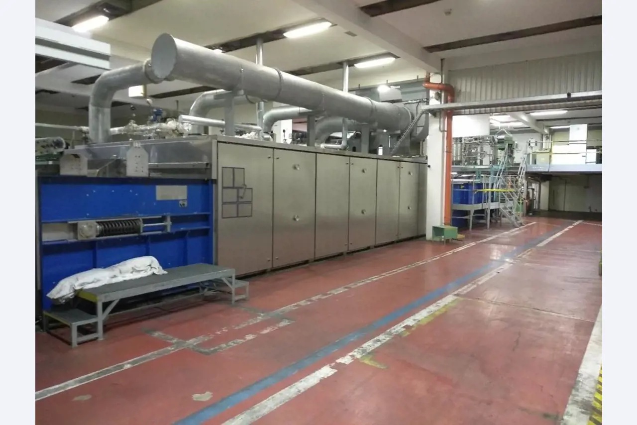 2 production lines for finishing synthetic textile fibers-1