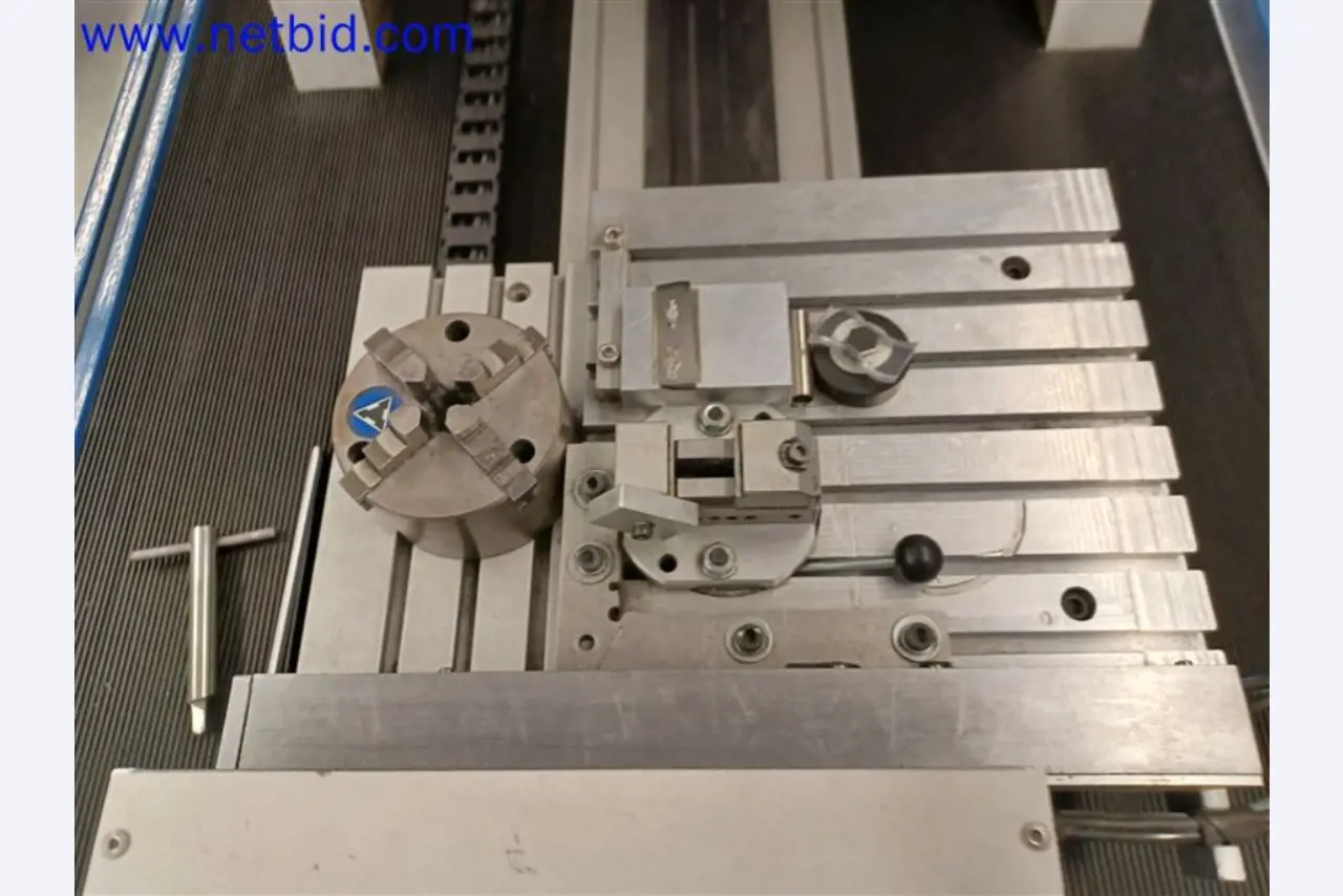 Machines, systems, office equipment, accessories and IT parts of a mechanical engineering company for "micro" CNC machines, manufacturer of control elements and software developer-1