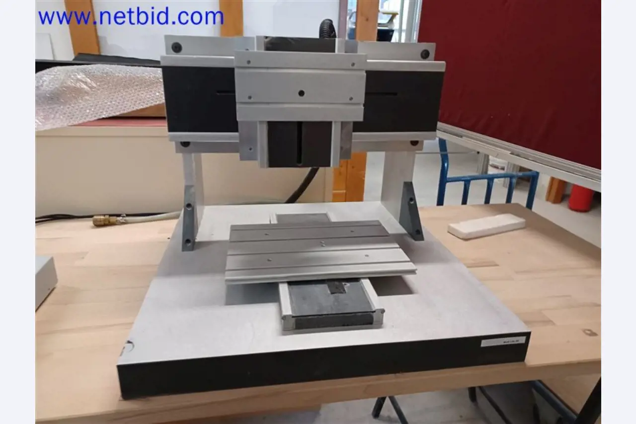 Machines, systems, office equipment, accessories and IT parts of a mechanical engineering company for "micro" CNC machines, manufacturer of control elements and software developer-1