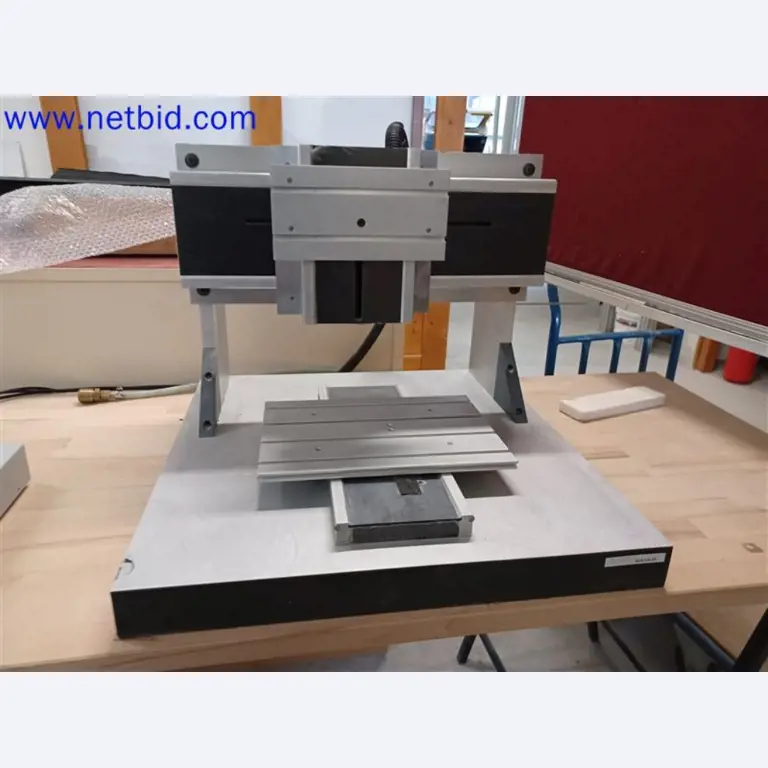 Machines, systems, office equipment, accessories and IT parts of a mechanical engineering company for "micro" CNC machines, manufacturer of control elements and software developer-1