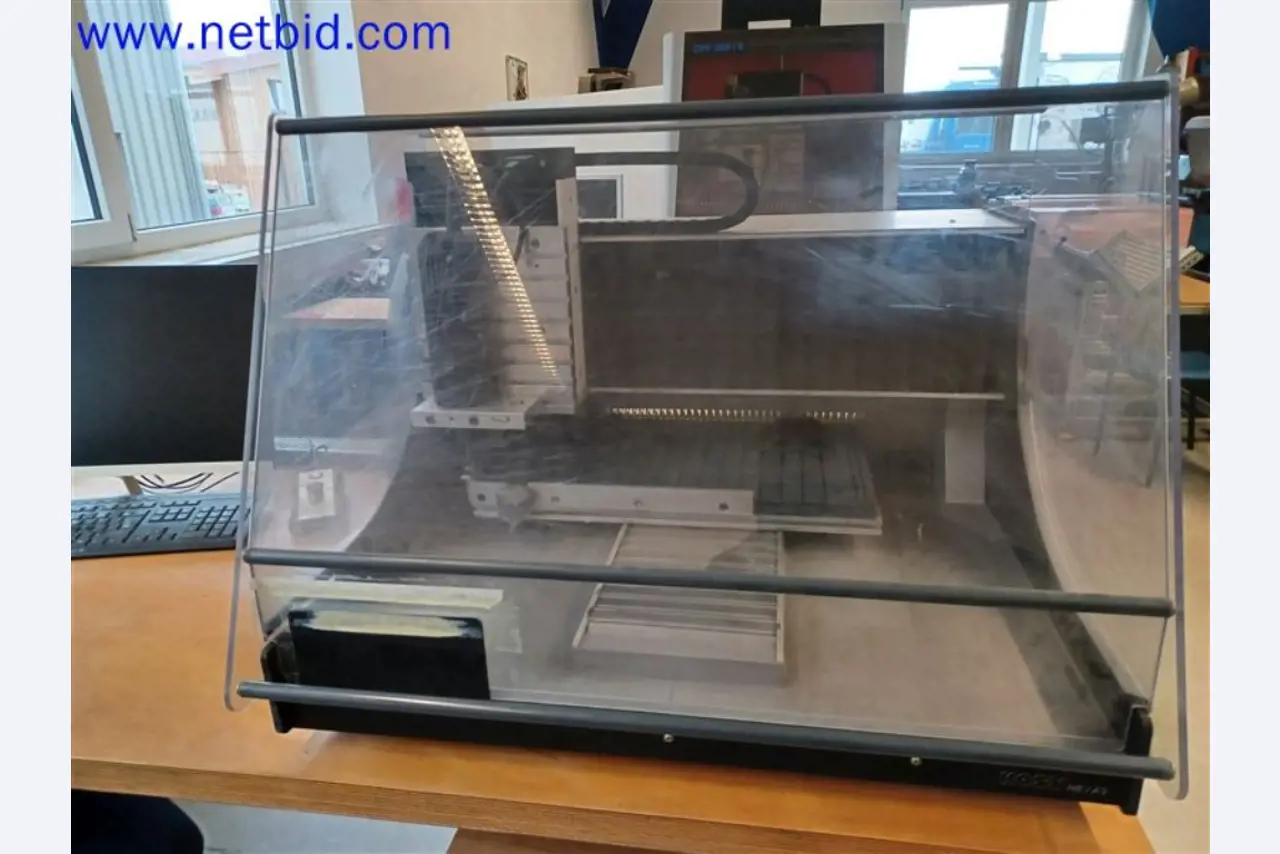 Machines, systems, office equipment, accessories and IT parts of a mechanical engineering company for "micro" CNC machines, manufacturer of control elements and software developer-1