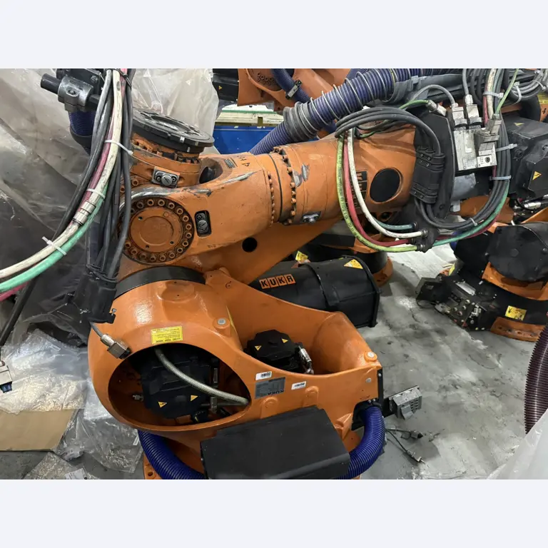 Industrijski roboti, stroji za obdelavo kovin, vozila in naprave IT-2