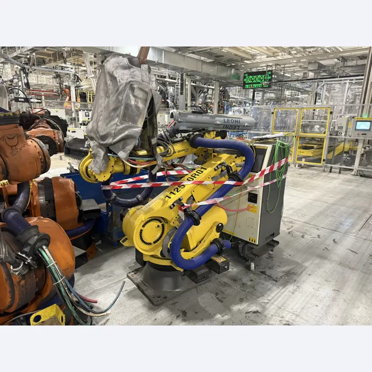 Industrijski roboti, stroji za obdelavo kovin, vozila in naprave IT-5