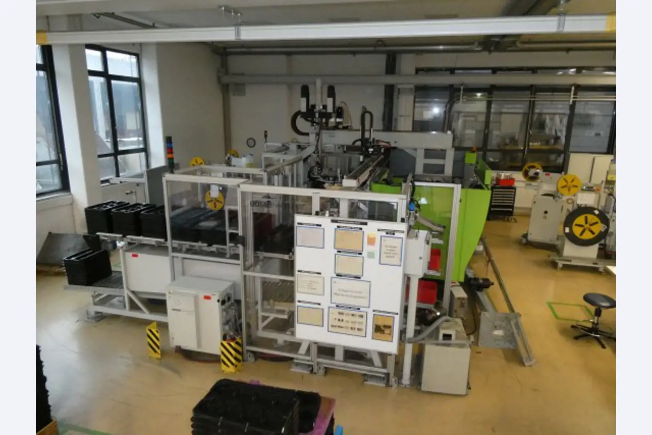 Stamping and injection molding systems of a stamping company-13