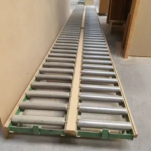 Transportador de rolos metálicos