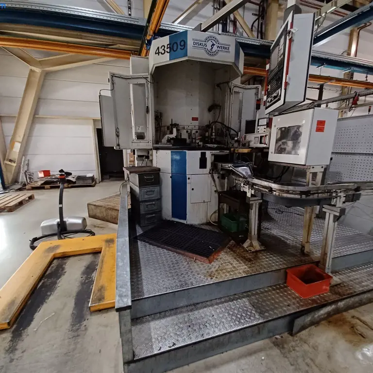 Portal dvostranski brusilni stroj Diskus DDS600XR-E1