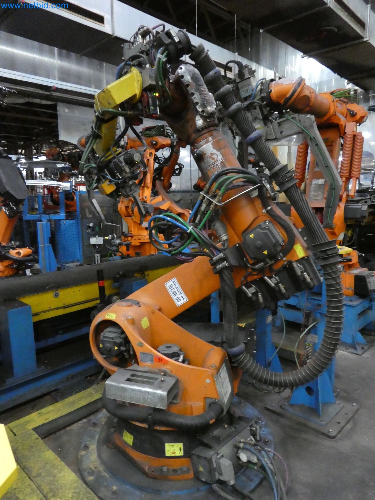 Robots, welding equipment and assembly accessories from the automotive industry-95