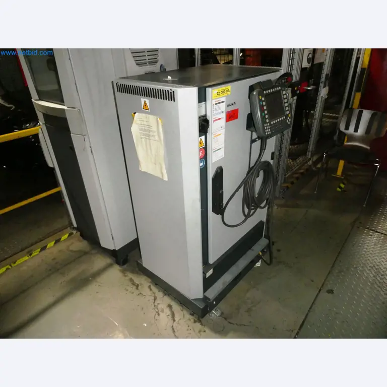 Roboty, svařovací zařízení a montážní příslušenství z automobilového průmyslu-42