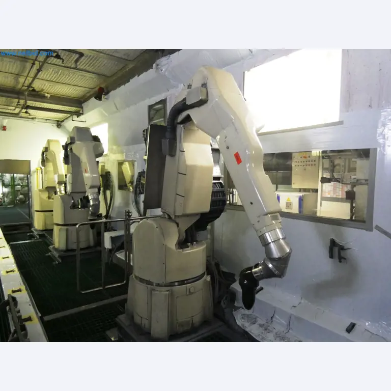 Roboty, svařovací zařízení a montážní příslušenství z automobilového průmyslu-17