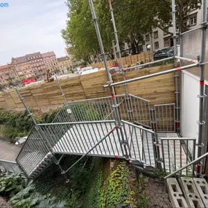Construction stair tower with walkway Layher