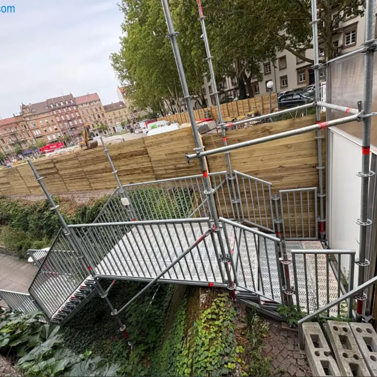 Construction stair tower with walkway Layher