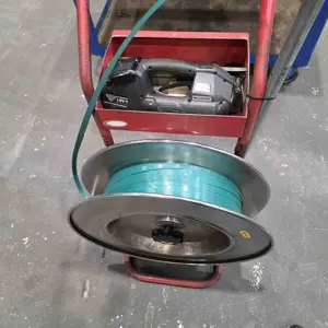 Plastic strapping tool