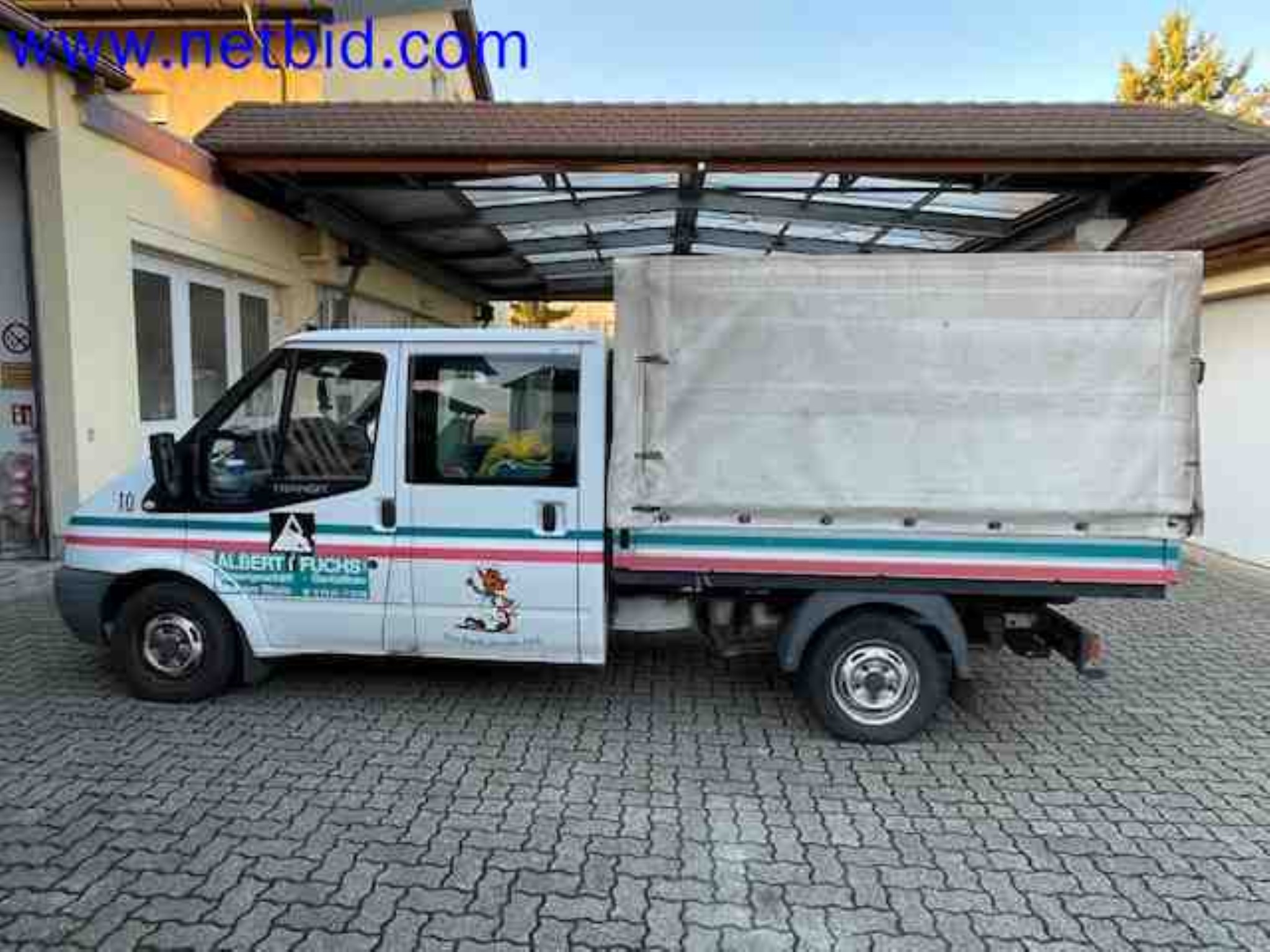 Trucks with loading crane, vans, Dokas with tarpaulin and bows, station wagons, forklift trucks, skips, small equipment, tools-1