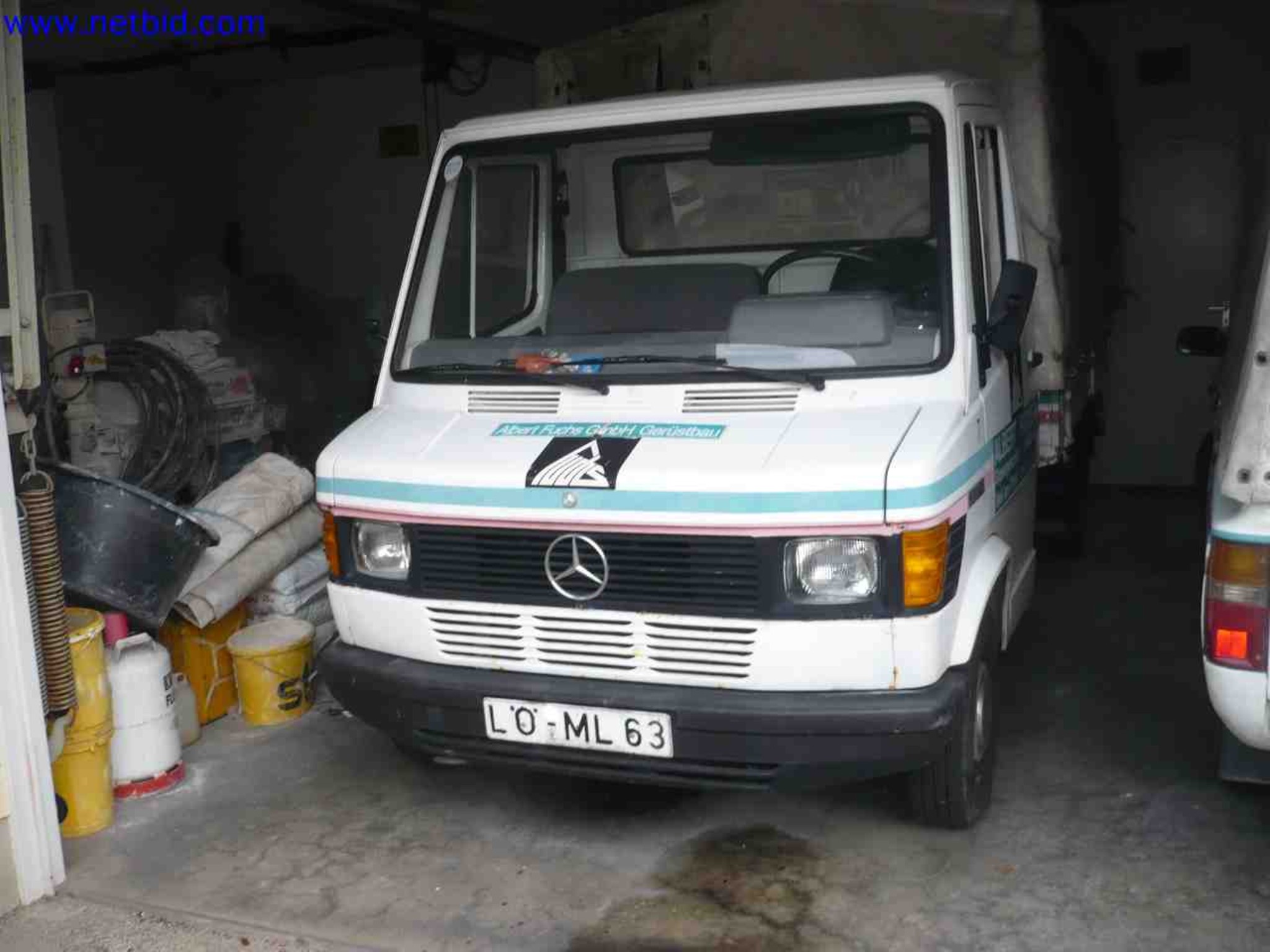 Trucks with loading crane, vans, Dokas with tarpaulin and bows, station wagons, forklift trucks, skips, small equipment, tools-1