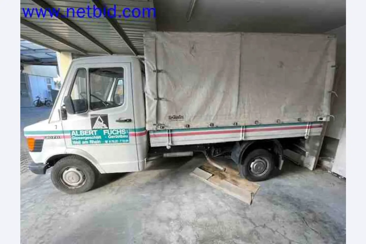 Trucks with loading crane, vans, Dokas with tarpaulin and bows, station wagons, forklift trucks, skips, small equipment, tools-2