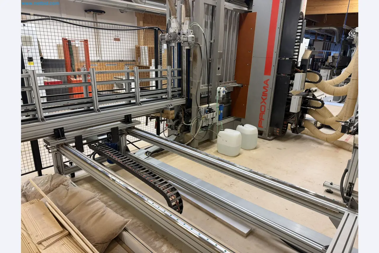 For sale due to insolvency. First-class longitudinal machining center with numerical control for modular furniture production with unloading robot-36