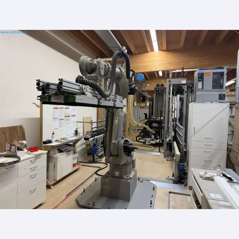 For sale due to insolvency. First-class longitudinal machining center with numerical control for modular furniture production with unloading robot-43
