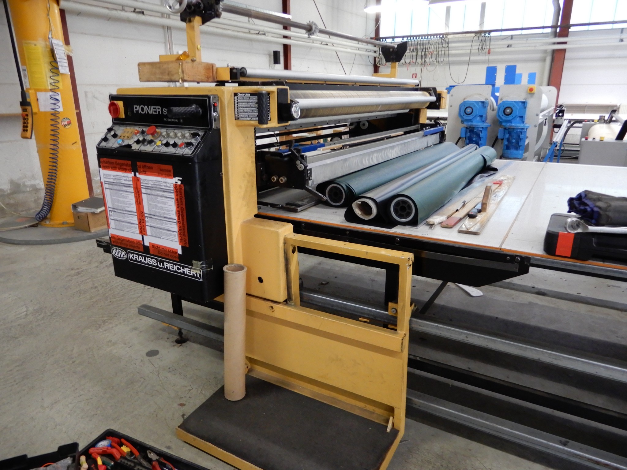 Machines for textile and tarpaulin processing-11