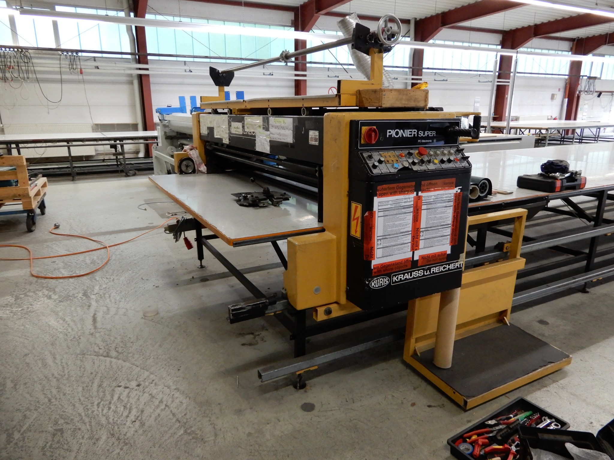 Machines for textile and tarpaulin processing-12