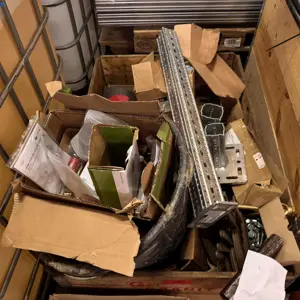 Lot of metal shelf uprights and shelves