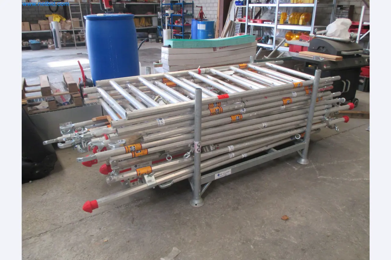 Scaffolding components (some from the construction site), machinery, and vehicles belonging to a construction company-1