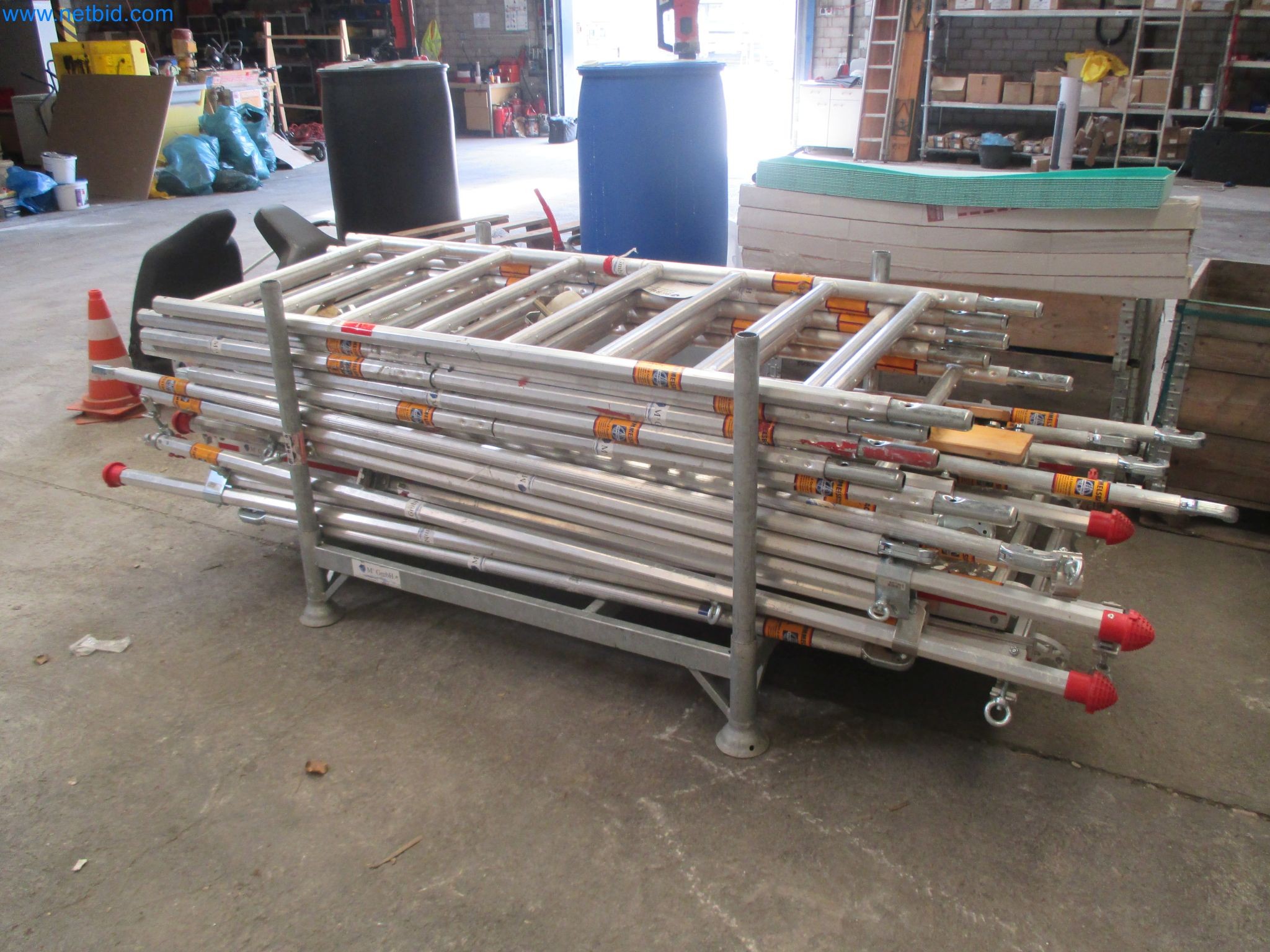 Scaffolding components (some from the construction site), machinery, and vehicles belonging to a construction company-2