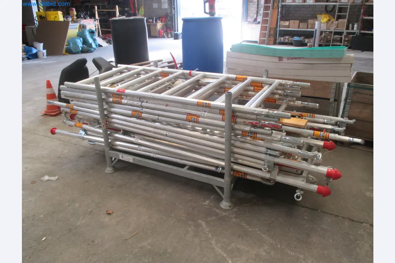 Scaffolding components (some from the construction site), machinery, and vehicles belonging to a construction company-2