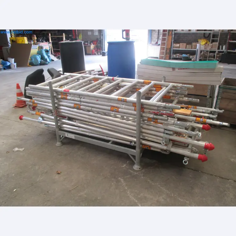 Scaffolding components (some from the construction site), machinery, and vehicles belonging to a construction company-2