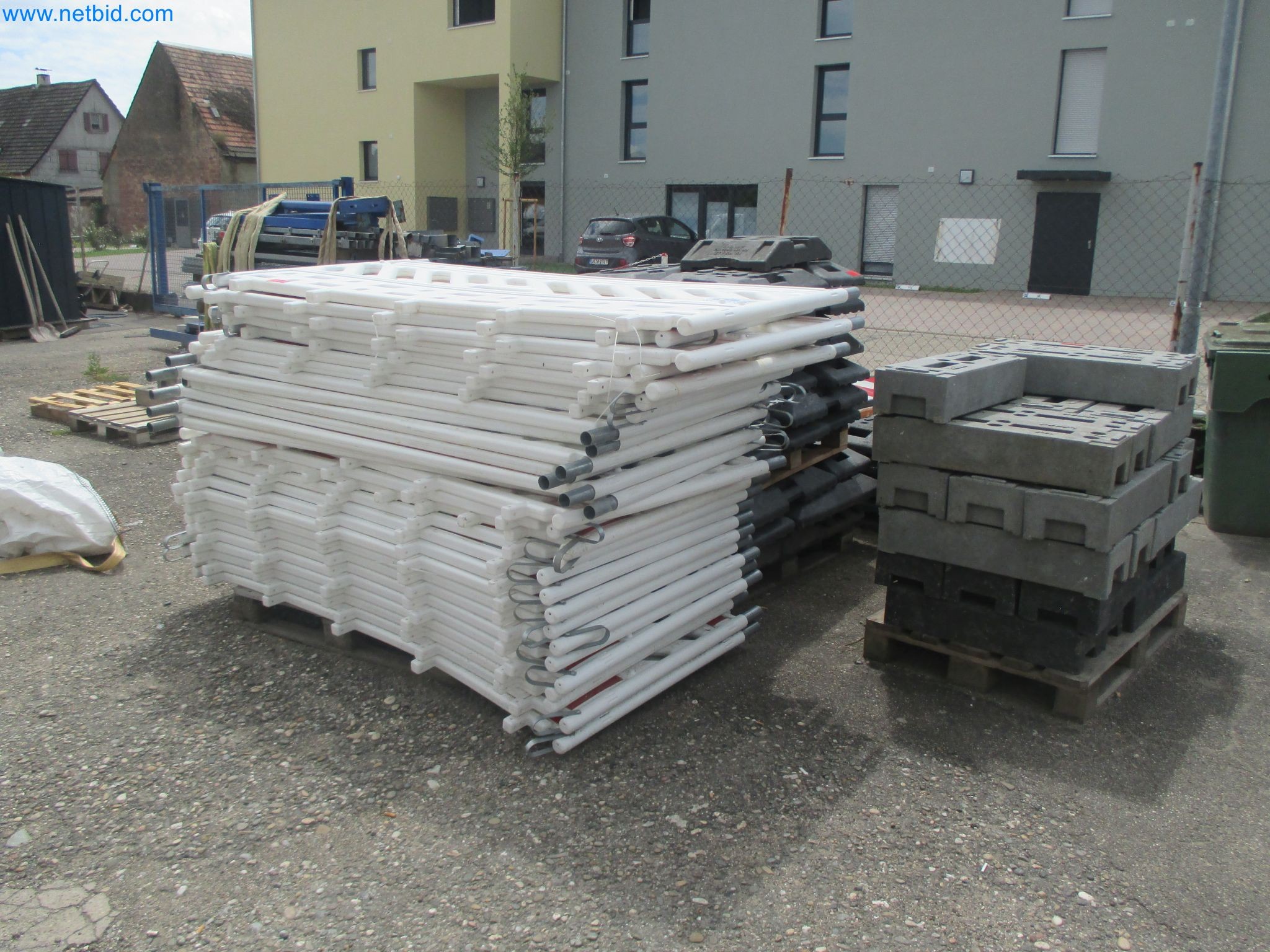 Scaffolding components (some from the construction site), machinery, and vehicles belonging to a construction company-1