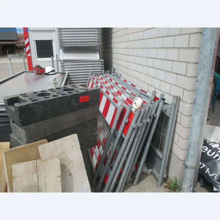 Scaffolding components (some from the construction site), machinery, and vehicles belonging to a construction company-1