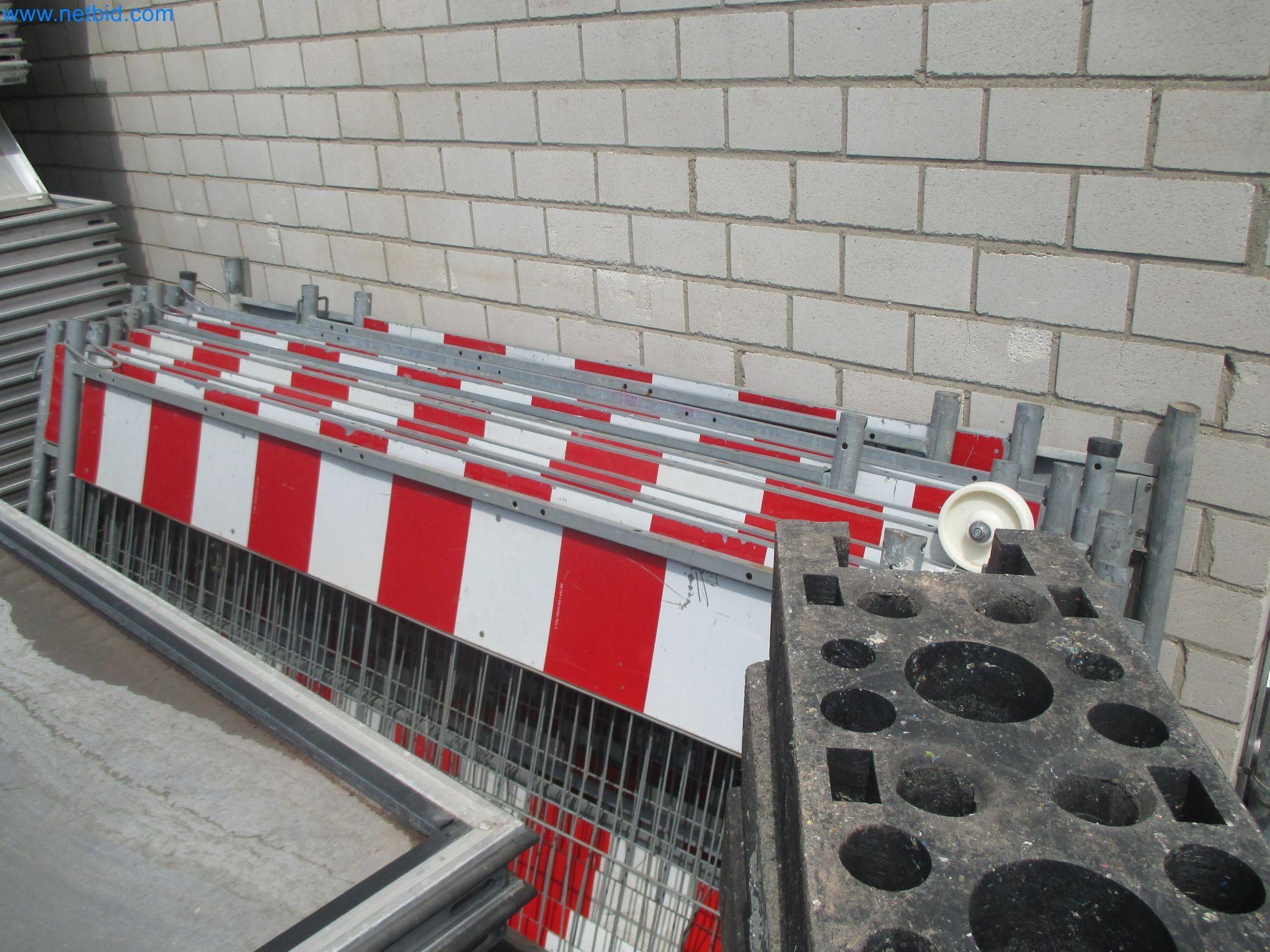Scaffolding components (some from the construction site), machinery, and vehicles belonging to a construction company-2
