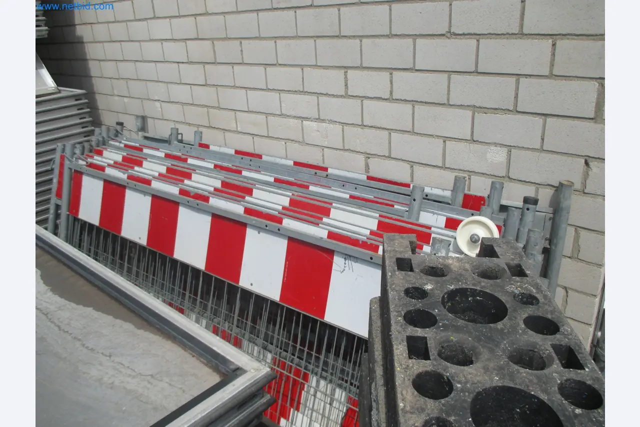 Scaffolding components (some from the construction site), machinery, and vehicles belonging to a construction company-2