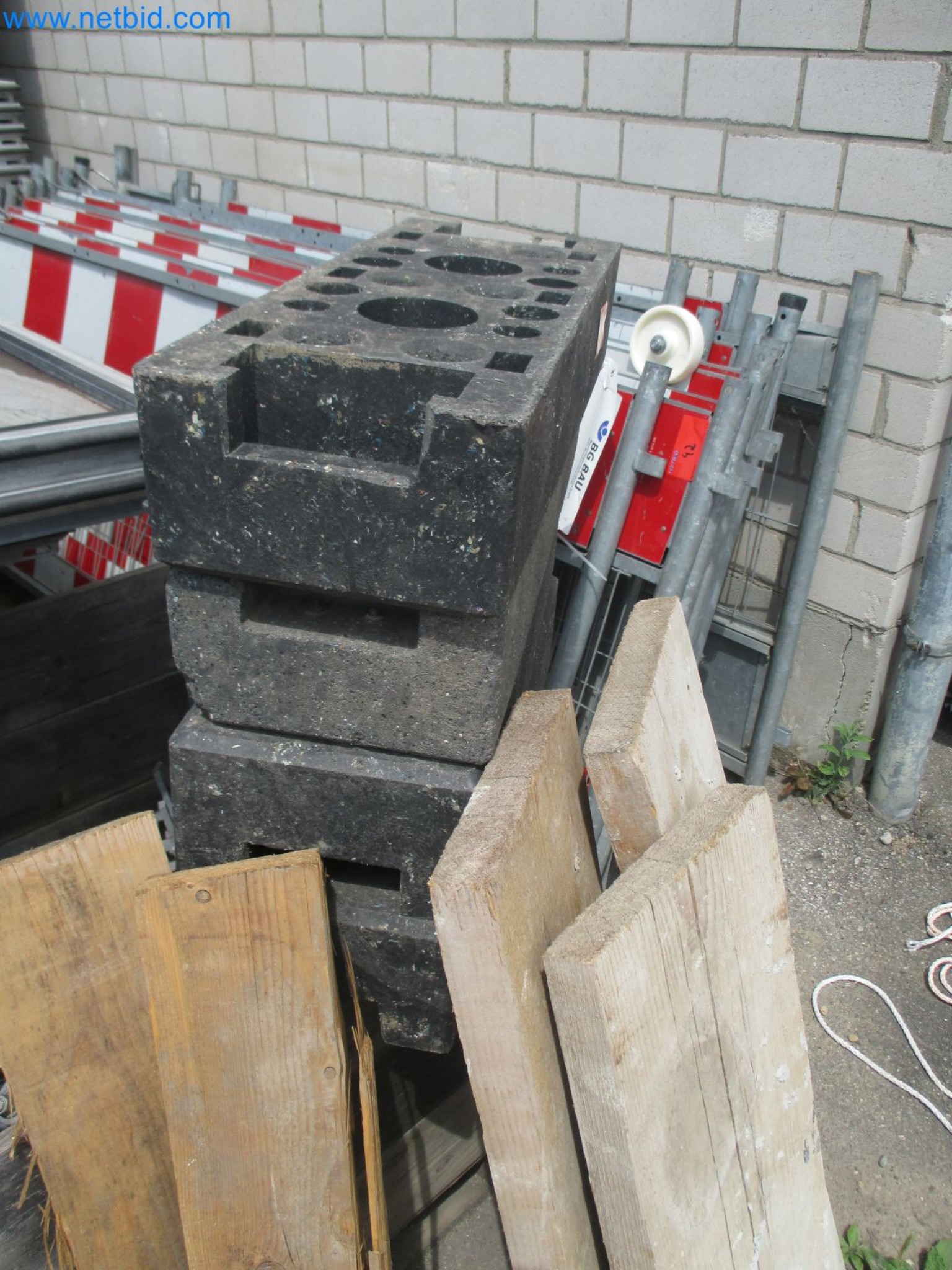 Scaffolding components (some from the construction site), machinery, and vehicles belonging to a construction company-3
