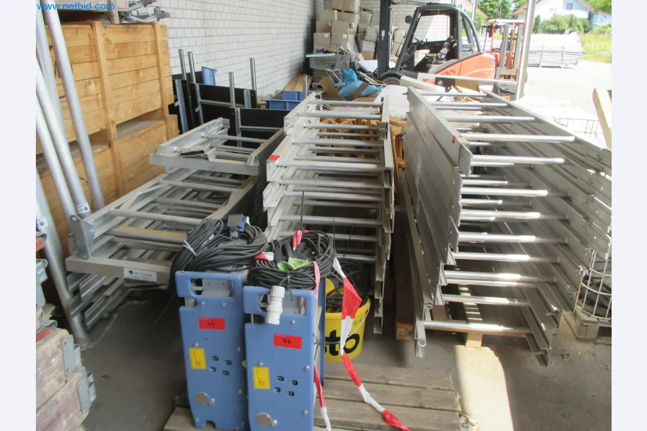 Scaffolding components (some from the construction site), machinery, and vehicles belonging to a construction company-1