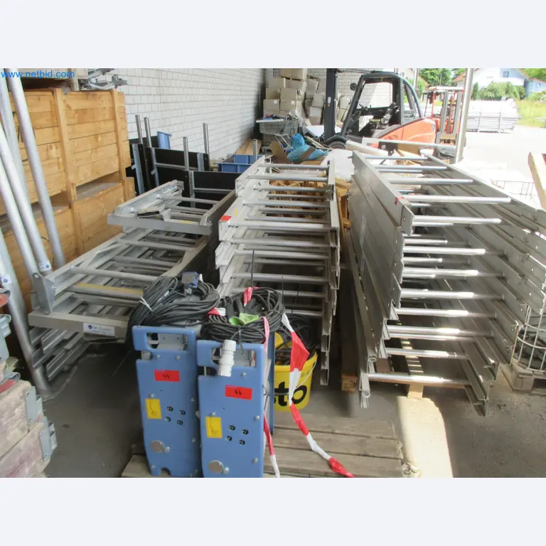 Scaffolding components (some from the construction site), machinery, and vehicles belonging to a construction company-1