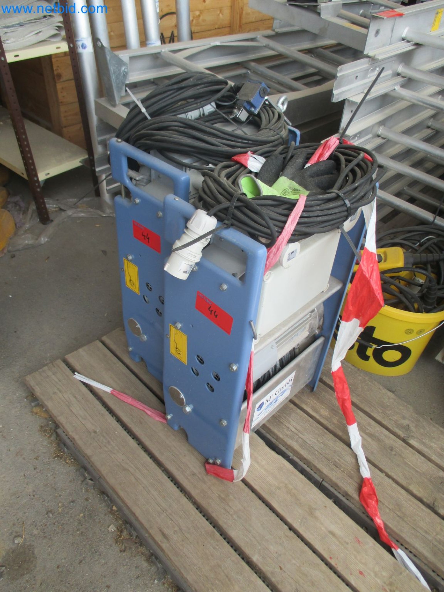 Scaffolding components (some from the construction site), machinery, and vehicles belonging to a construction company-2