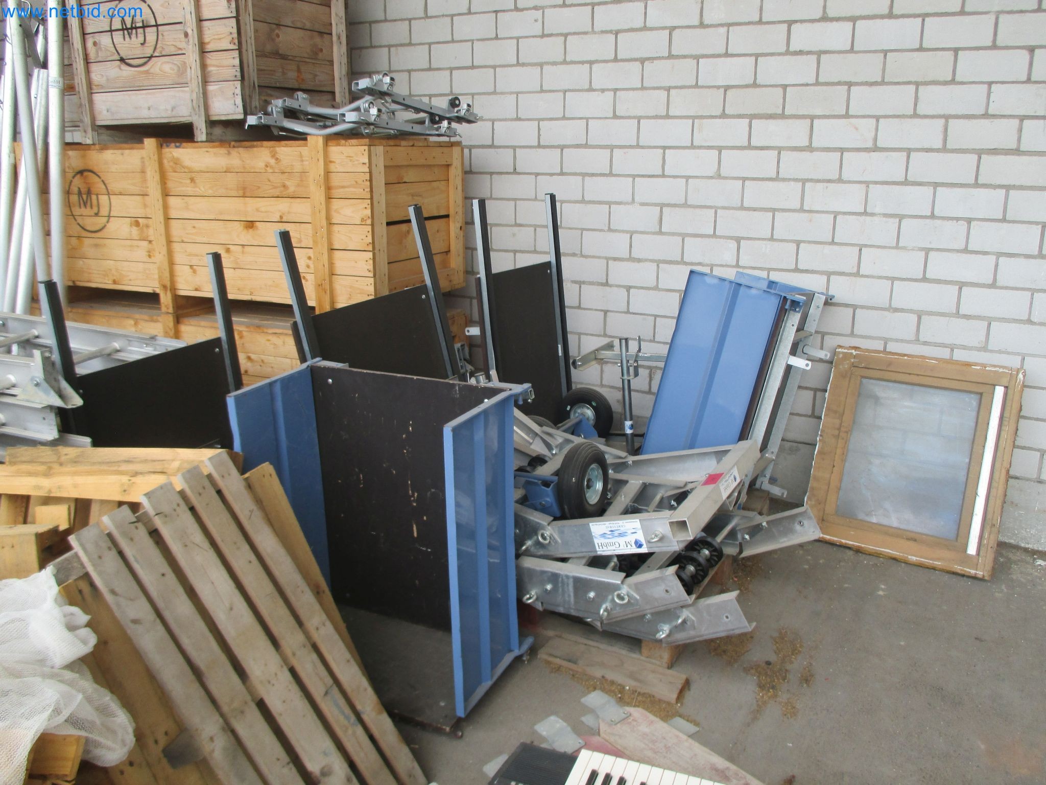 Scaffolding components (some from the construction site), machinery, and vehicles belonging to a construction company-5