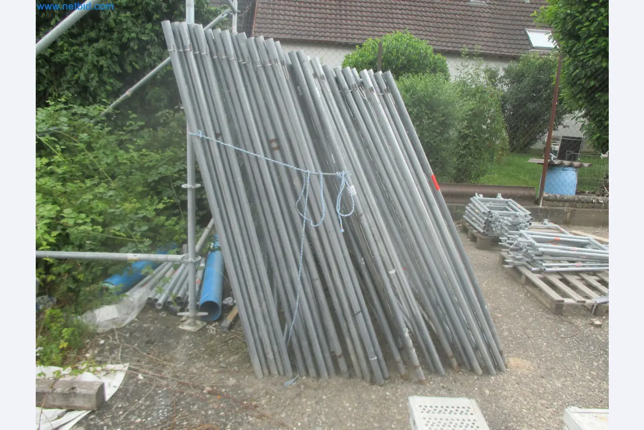 Scaffolding components (some from the construction site), machinery, and vehicles belonging to a construction company-1