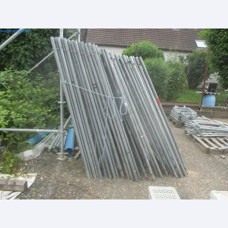 Scaffolding components (some from the construction site), machinery, and vehicles belonging to a construction company-1