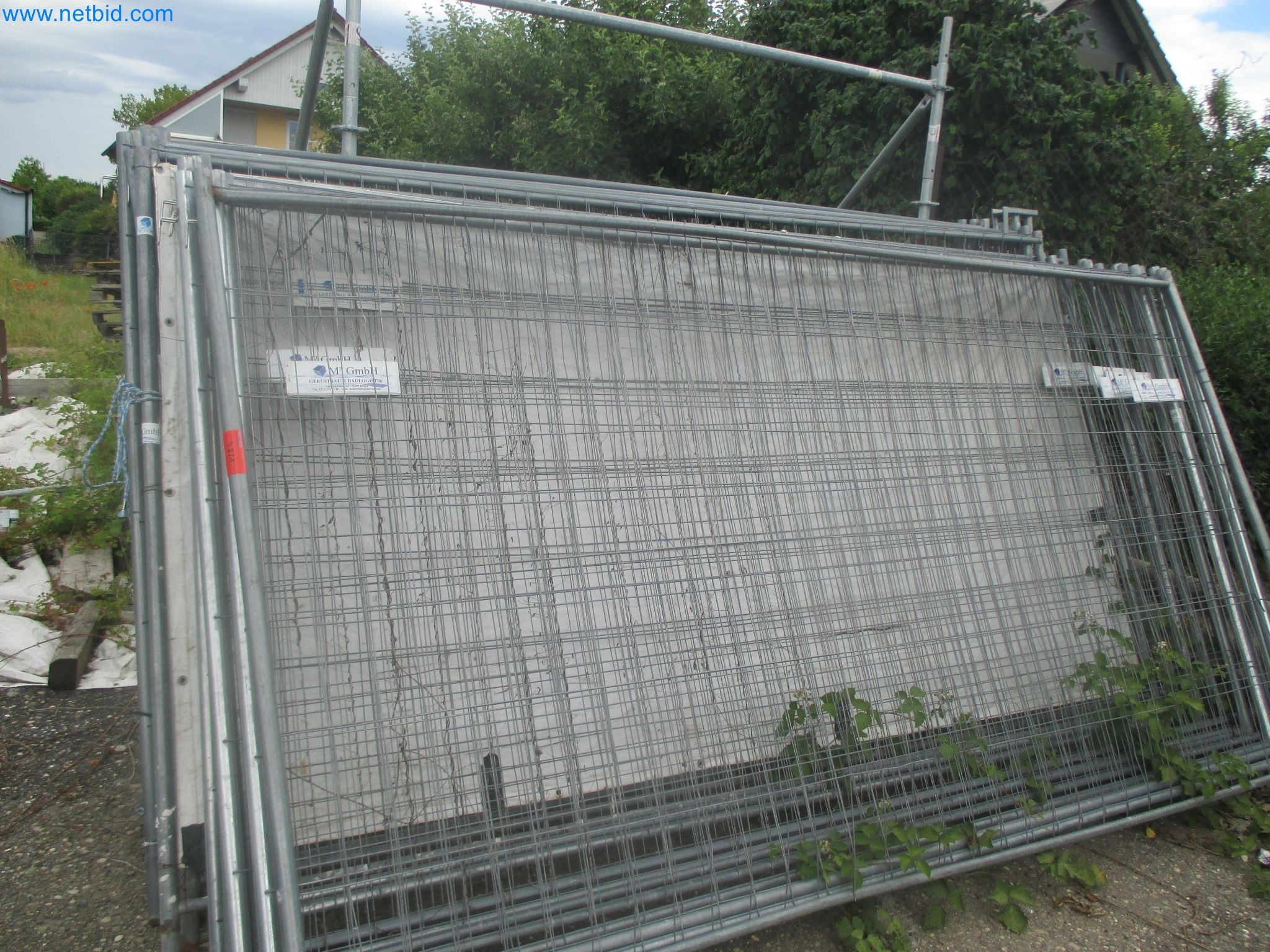 Scaffolding components (some from the construction site), machinery, and vehicles belonging to a construction company-2