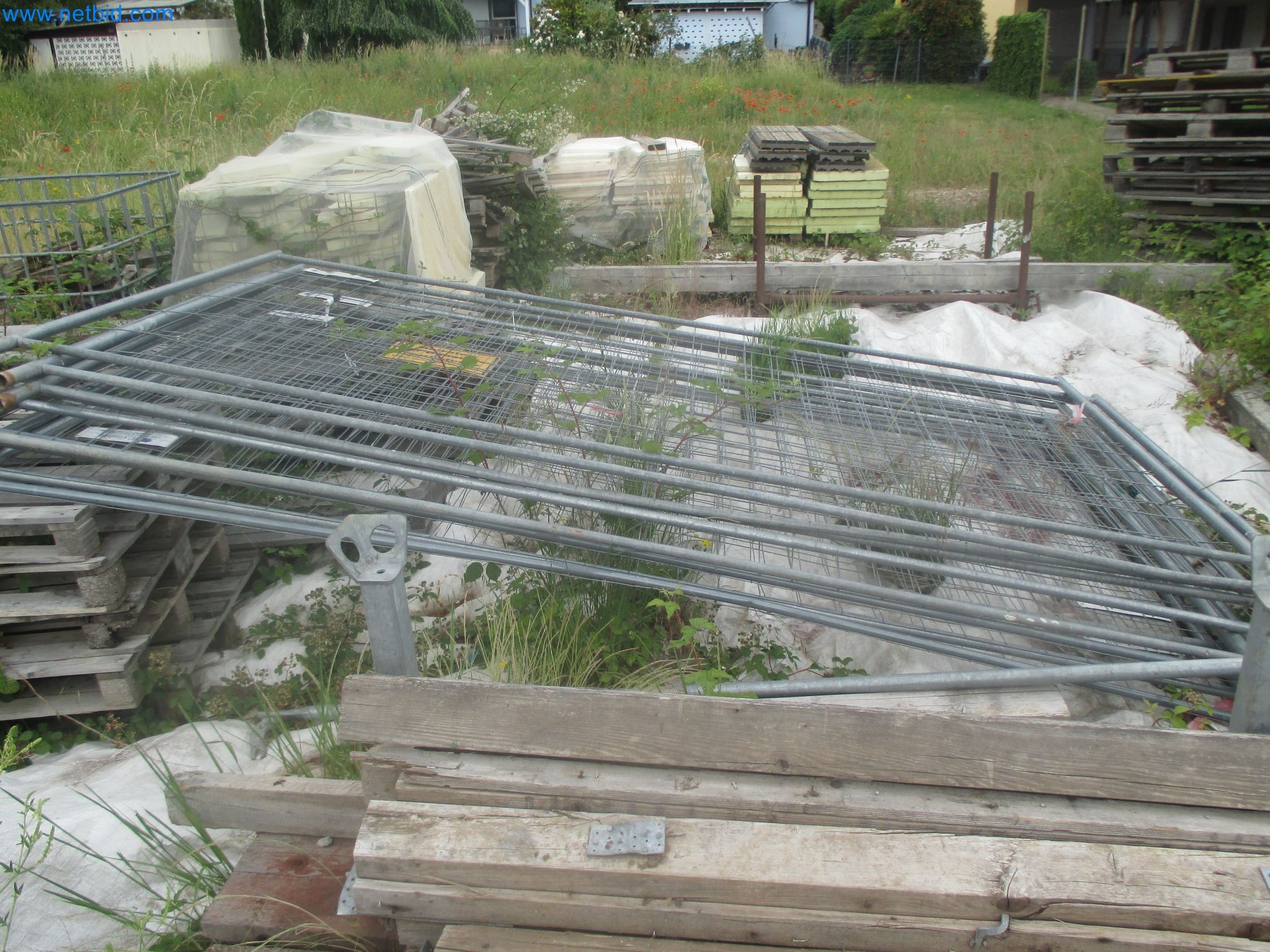 Scaffolding components (some from the construction site), machinery, and vehicles belonging to a construction company-3