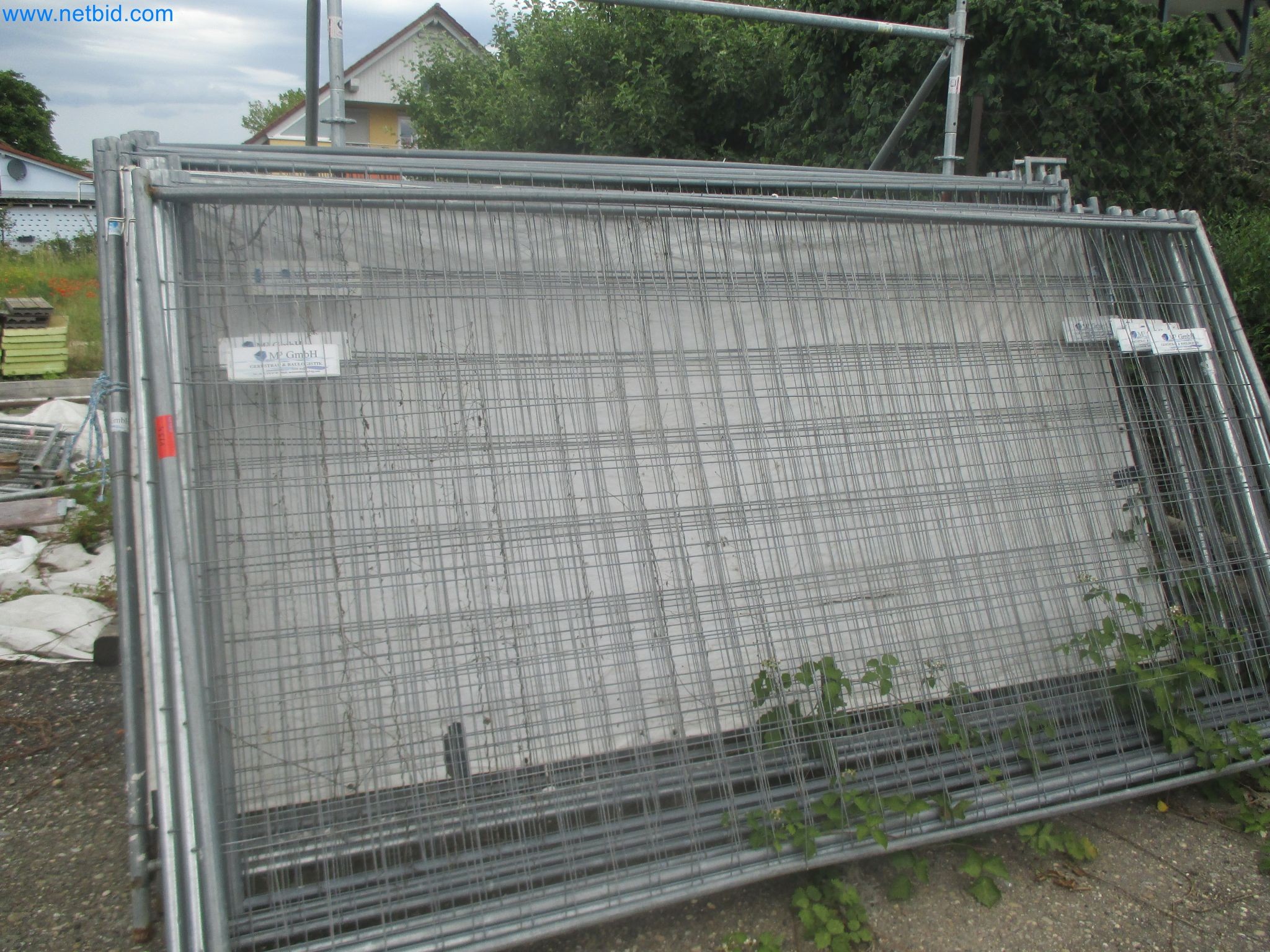 Scaffolding components (some from the construction site), machinery, and vehicles belonging to a construction company-5