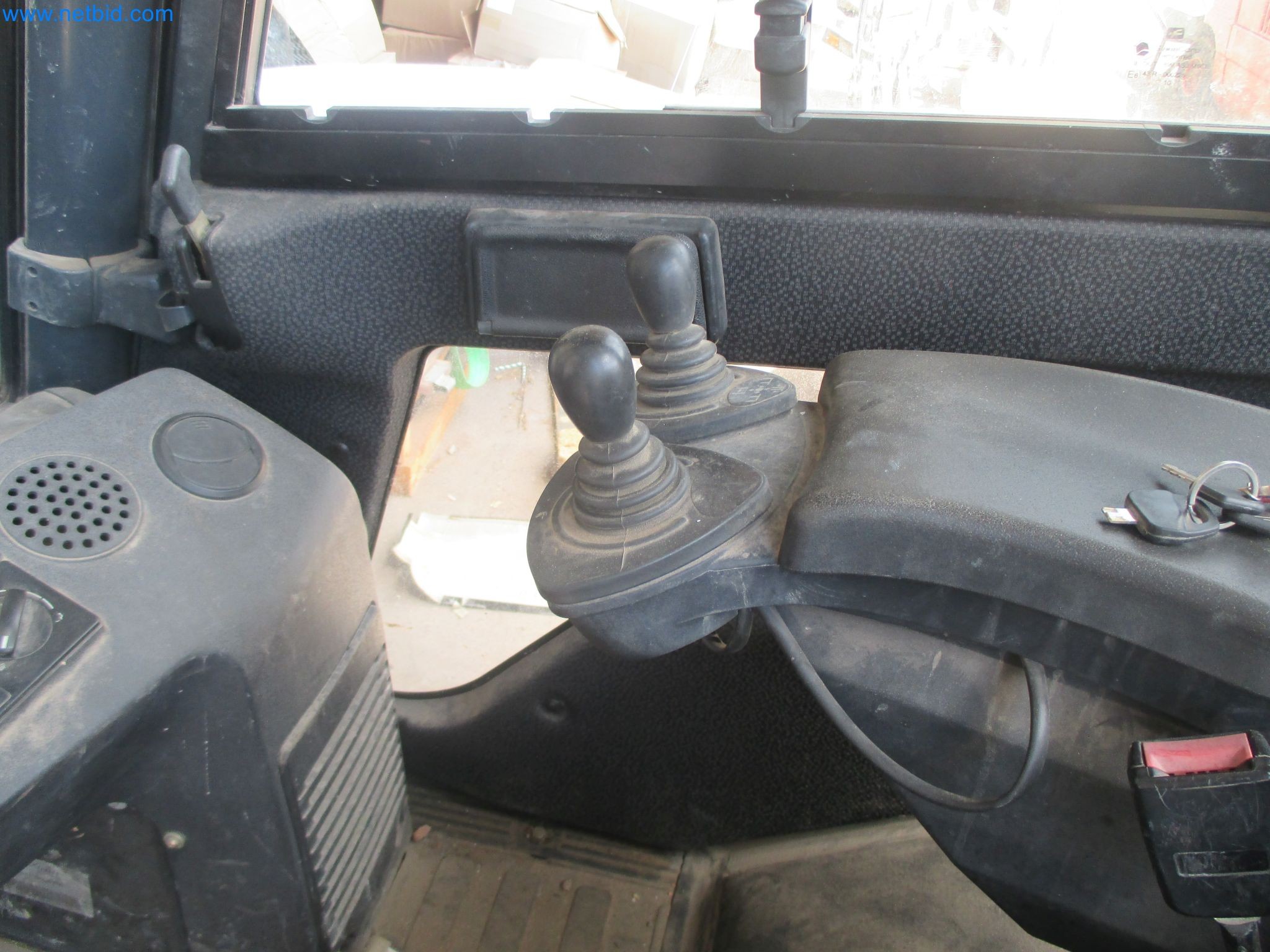 Scaffolding components (some from the construction site), machinery, and vehicles belonging to a construction company-5