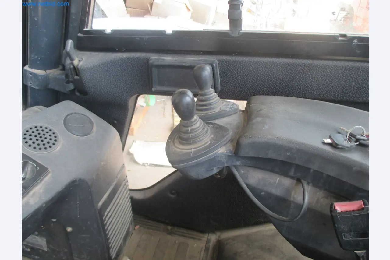 Scaffolding components (some from the construction site), machinery, and vehicles belonging to a construction company-5