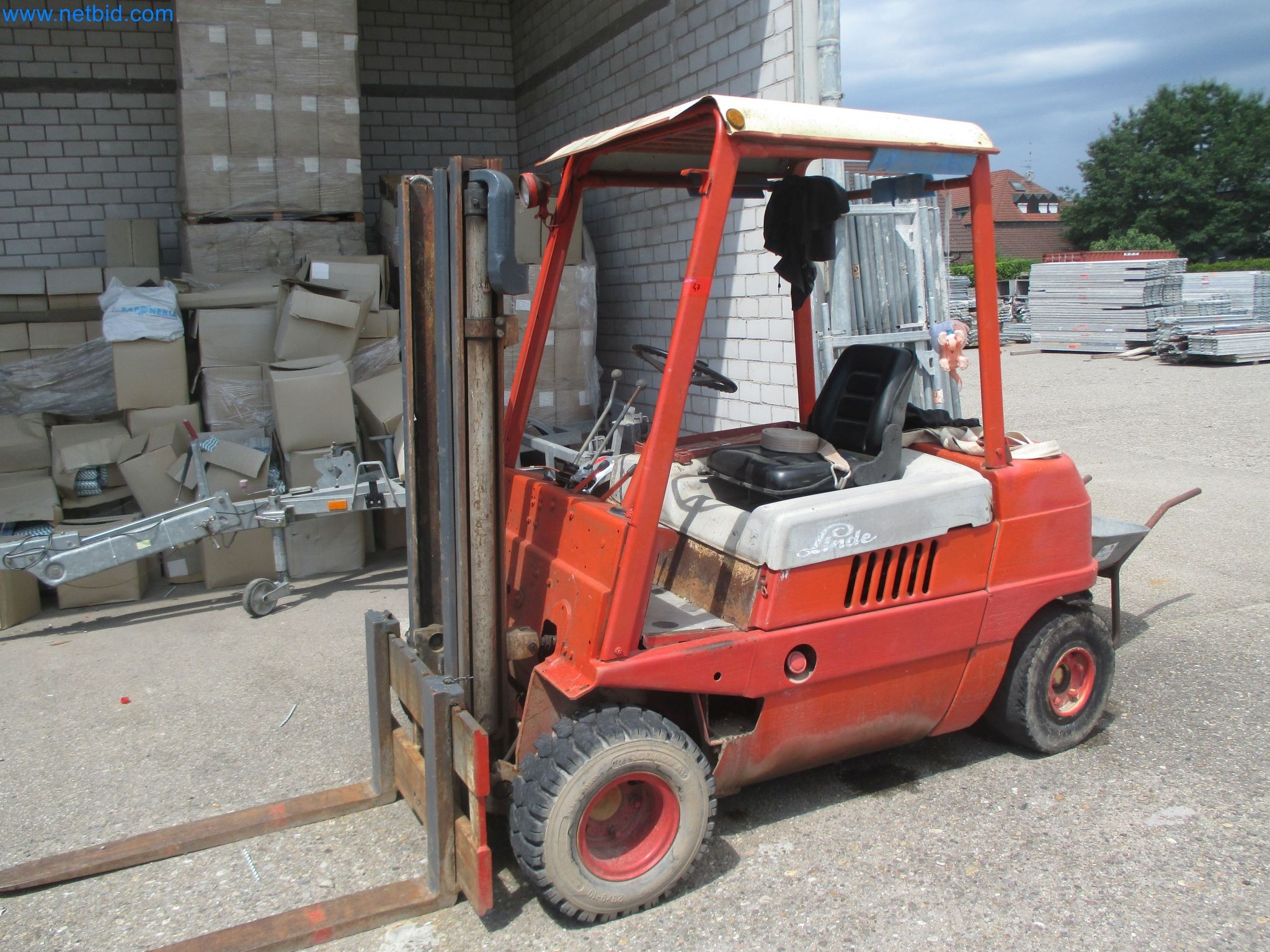 Scaffolding components (some from the construction site), machinery, and vehicles belonging to a construction company-1